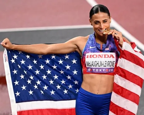 The American sprinter clocks quickest women’s 400m in four decades to win championship title